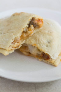 Pizza Calzones with Sausage, Pepperoni, and Onion | https://www.roseclearfield.com