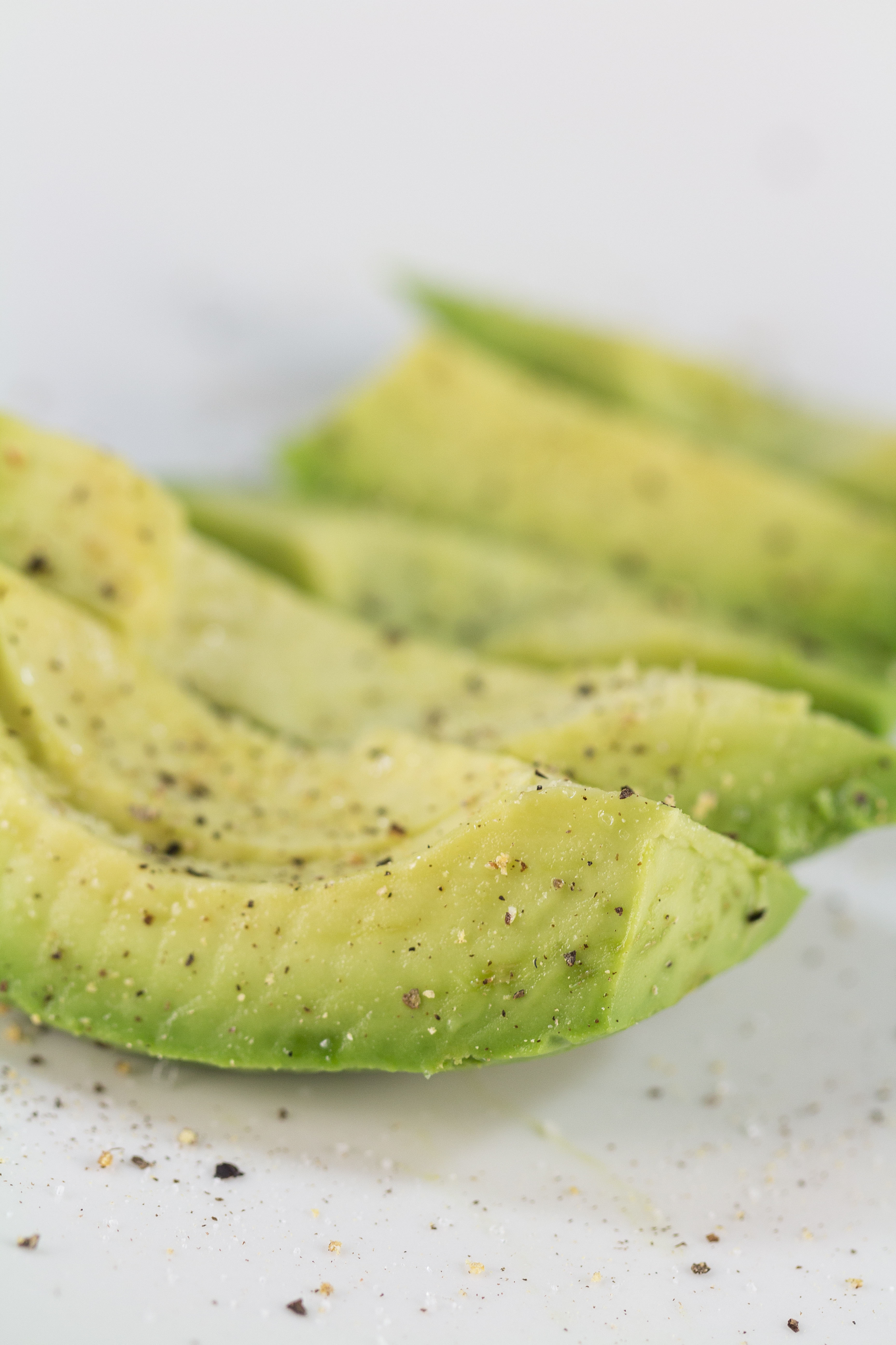 Sliced Avocado With Salt and Pepper | https://www.roseclearfield.com