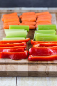 Chopped veggies ready to pair with homemade hummus. Click through for a fabulous white bean hummus recipe! | https://www.roseclearfield.com