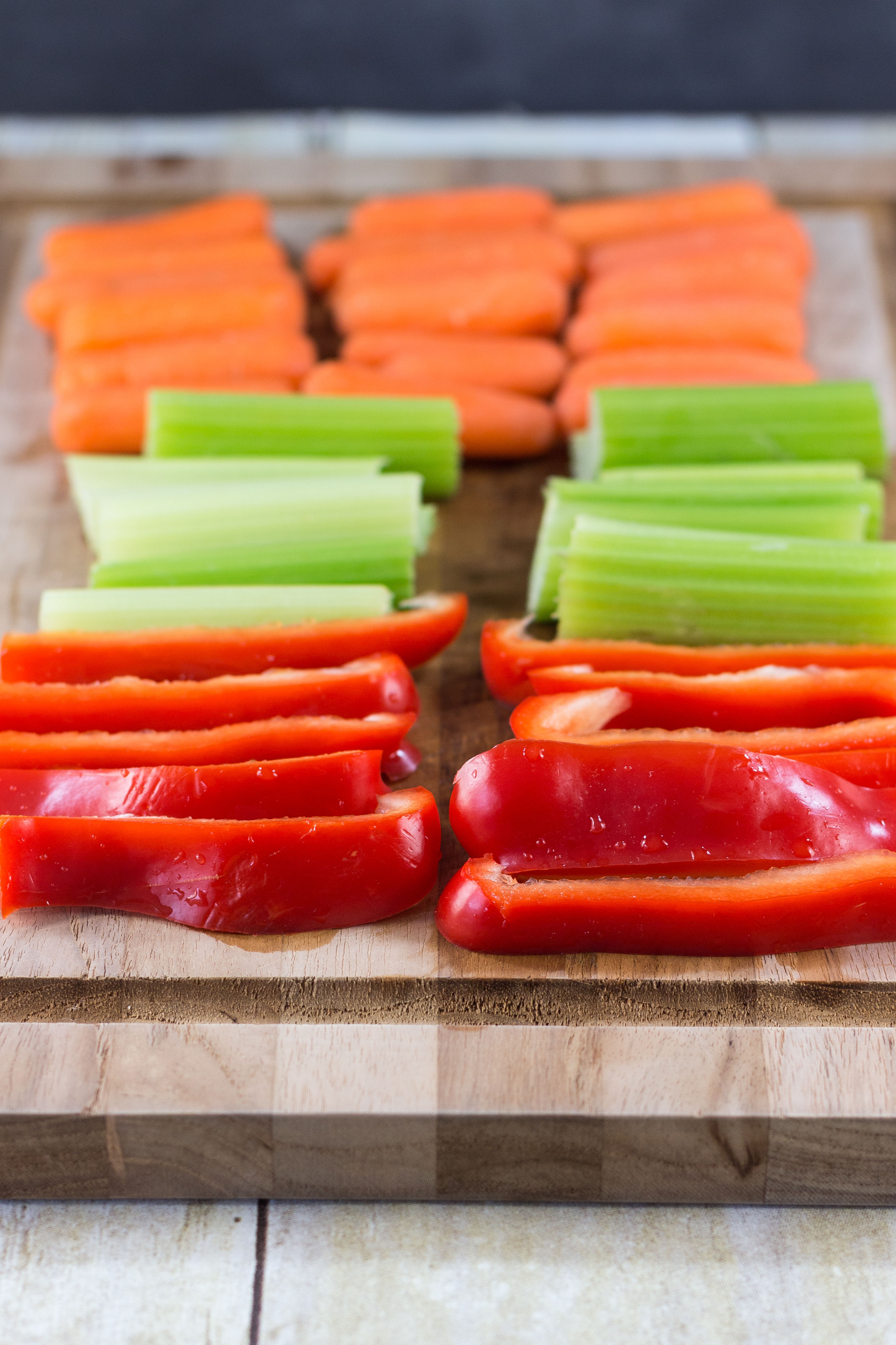 Chopped veggies ready to pair with homemade hummus. Click through for a fabulous white bean hummus recipe! | https://www.roseclearfield.com