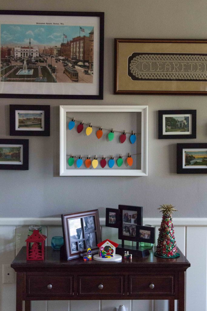 A handmade paper Christmas lights display is perfect for an entryway or living room. | https://www.roseclearfield.com