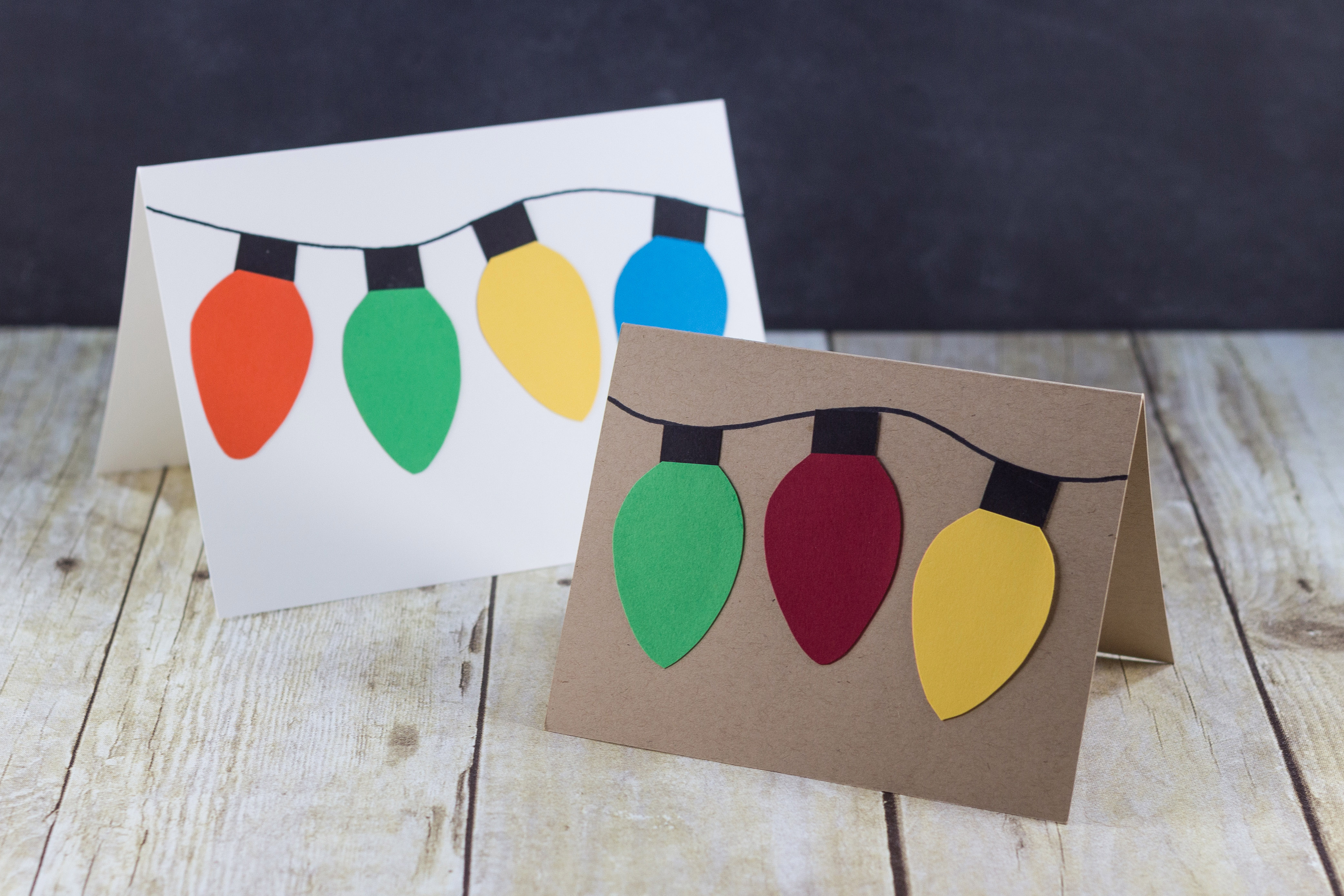 Handmade holiday cards with DIY paper Christmas lights. | https://www.roseclearfield.com