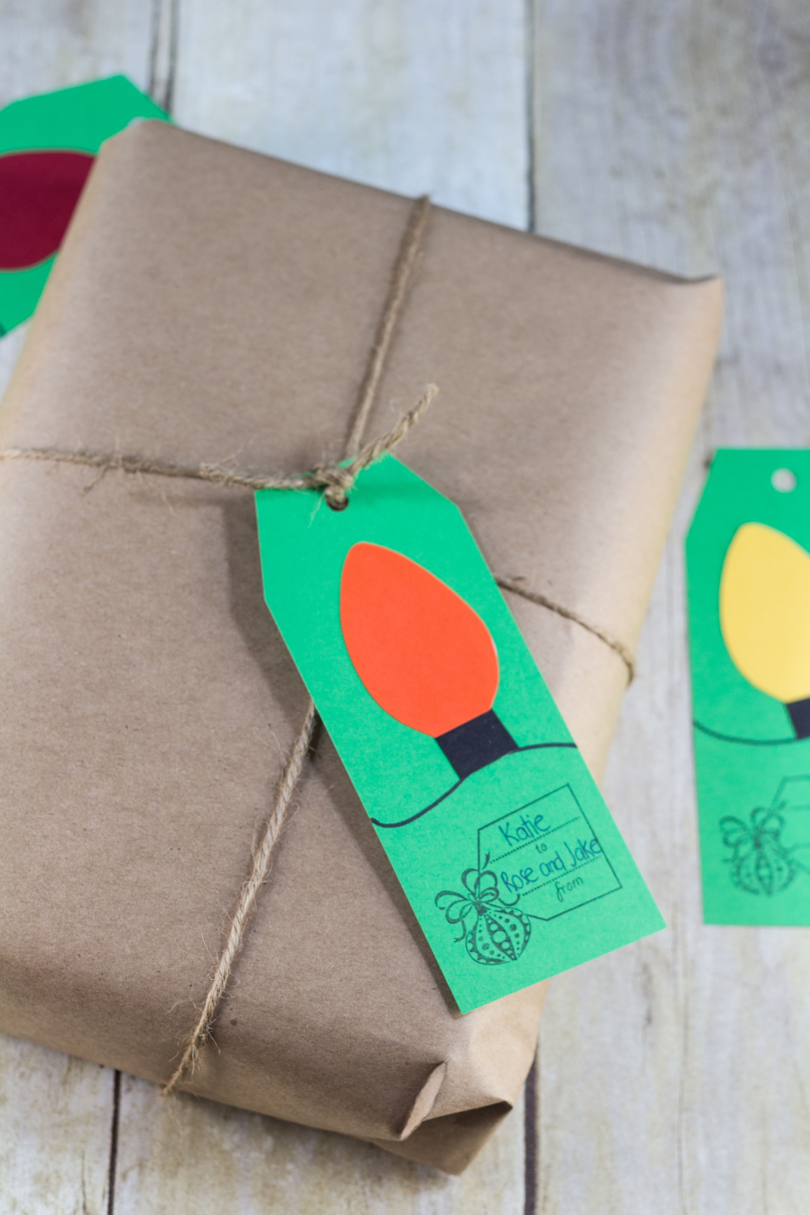 Paper Christmas light gift tags. I used green to pair with kraft wrapping, but I love kraft gift tags, too. | https://www.roseclearfield.com