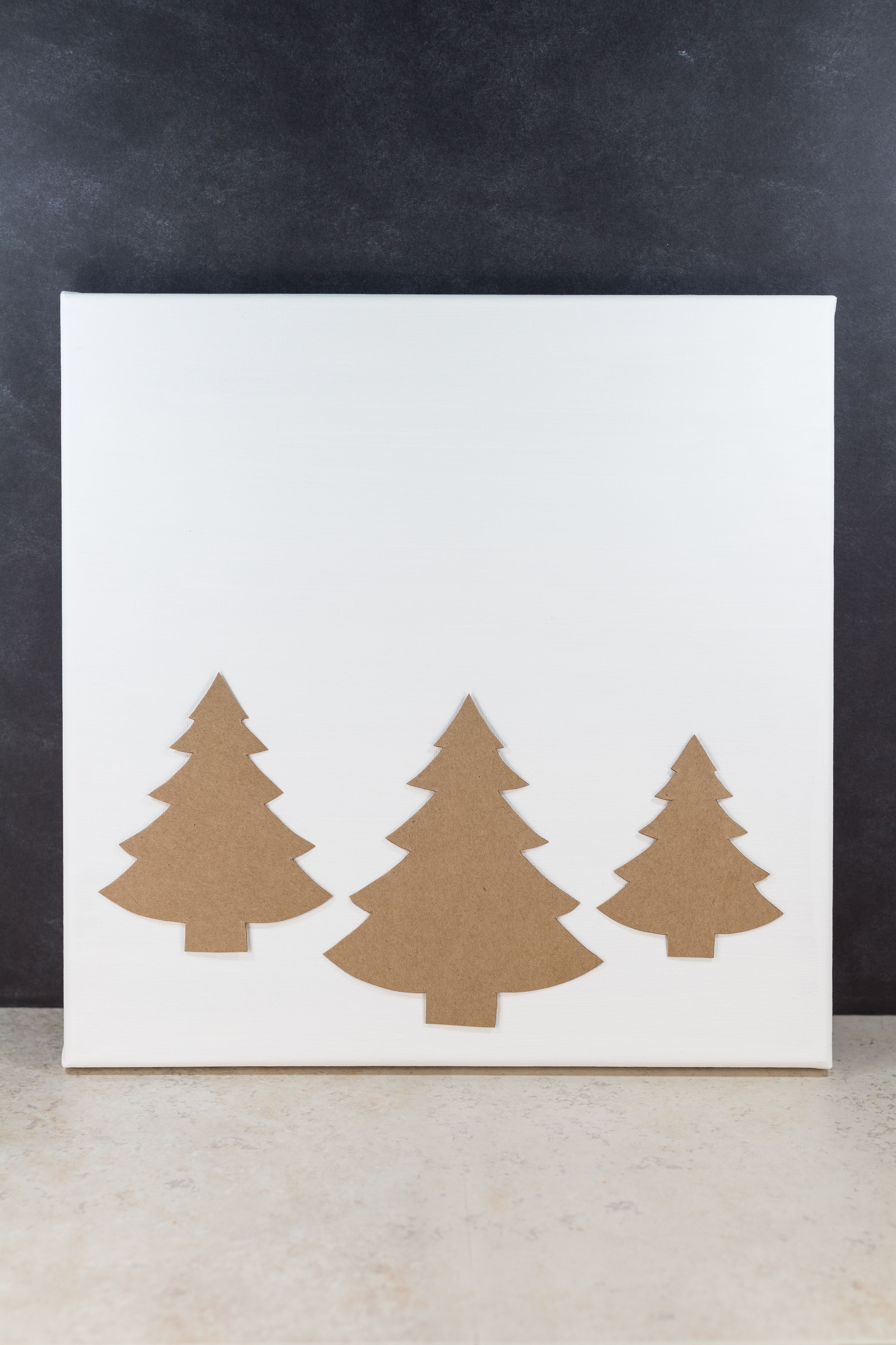 DIY Pine Tree Holiday Decor Canvas Wall Art | https://www.roseclearfield.com