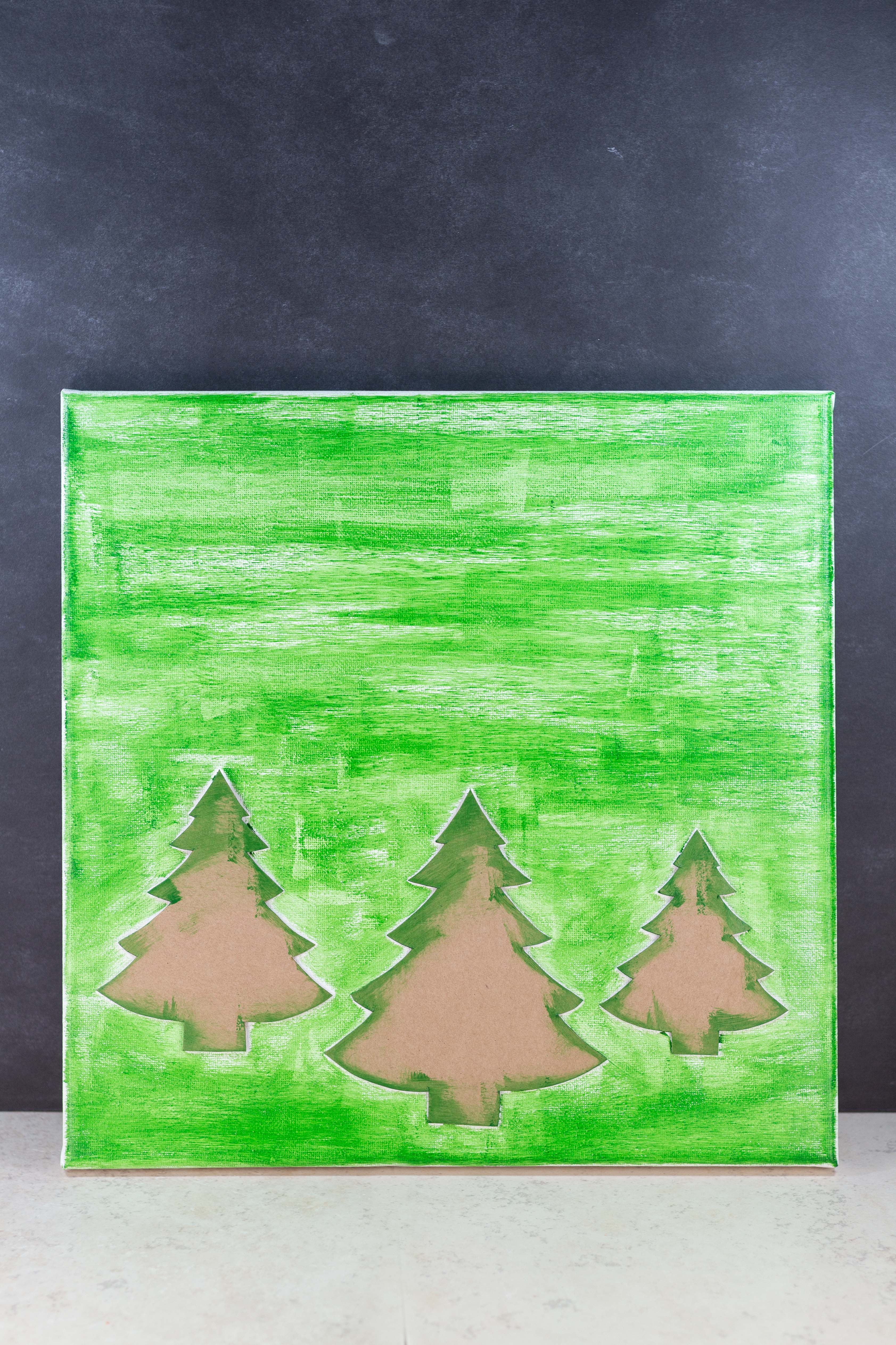 DIY Pine Tree Holiday Decor Canvas Wall Art | https://www.roseclearfield.com