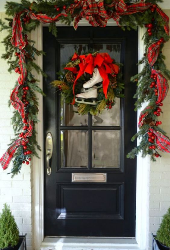 Christmas Decoration Inspiration - garland and ice skates for the front door.