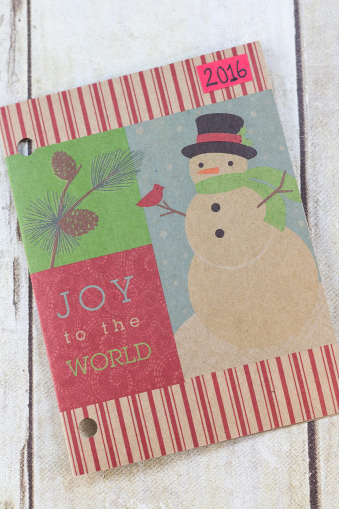 DIY Upcycled Christmas Card Books - I like to use a portrait oriented Christmas card with no photo for the cover.