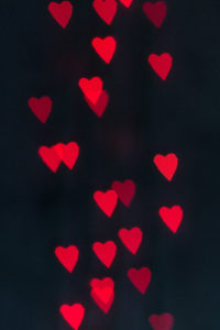 DIY heart bokeh...so easy with a DSLR camera, prime lens, and homemade paper heart filter! | https://www.roseclearfield.com