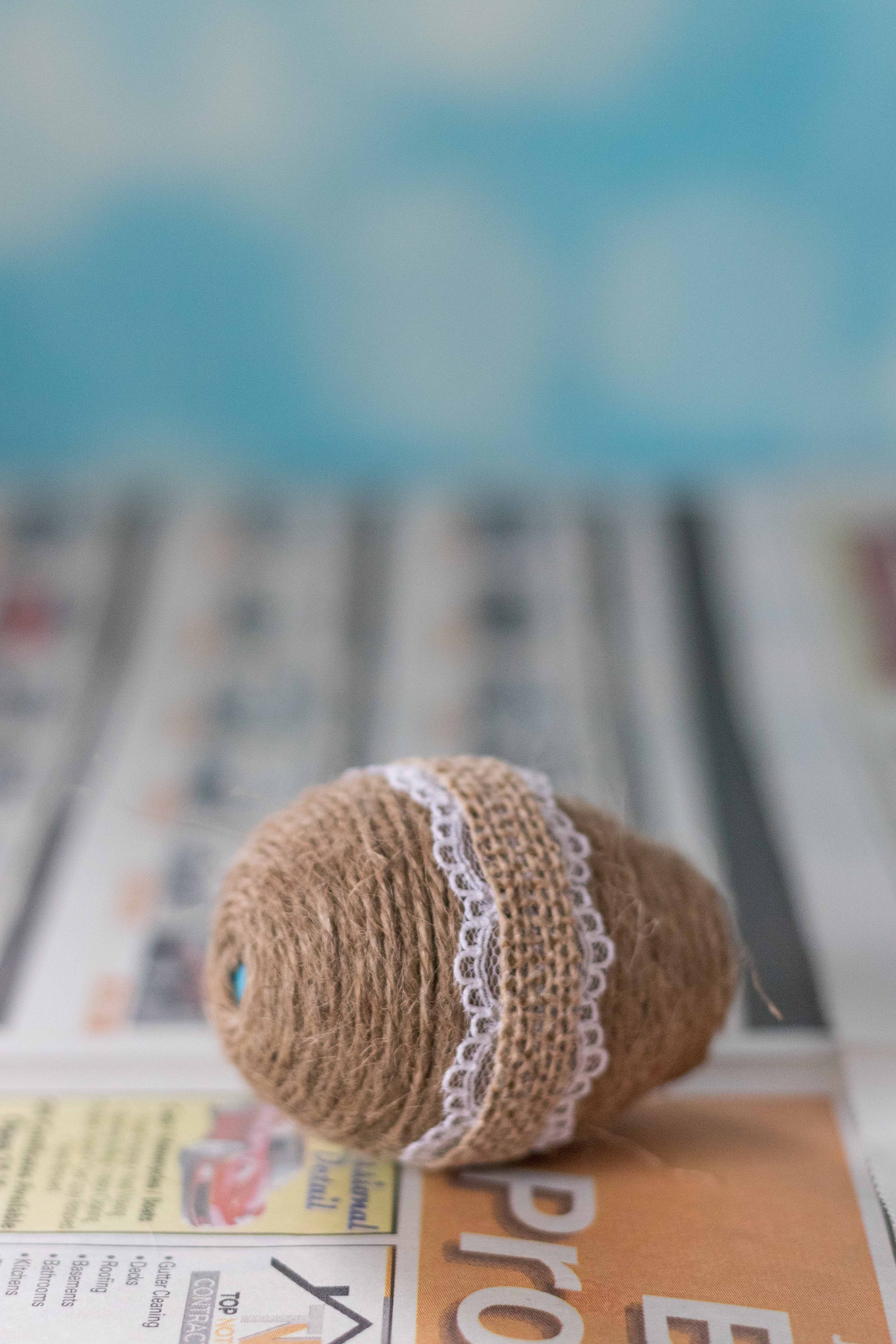 DIY Twine Wrapped Plastic Easter Eggs with Lace and Ribbon | https://www.roseclearfield.com