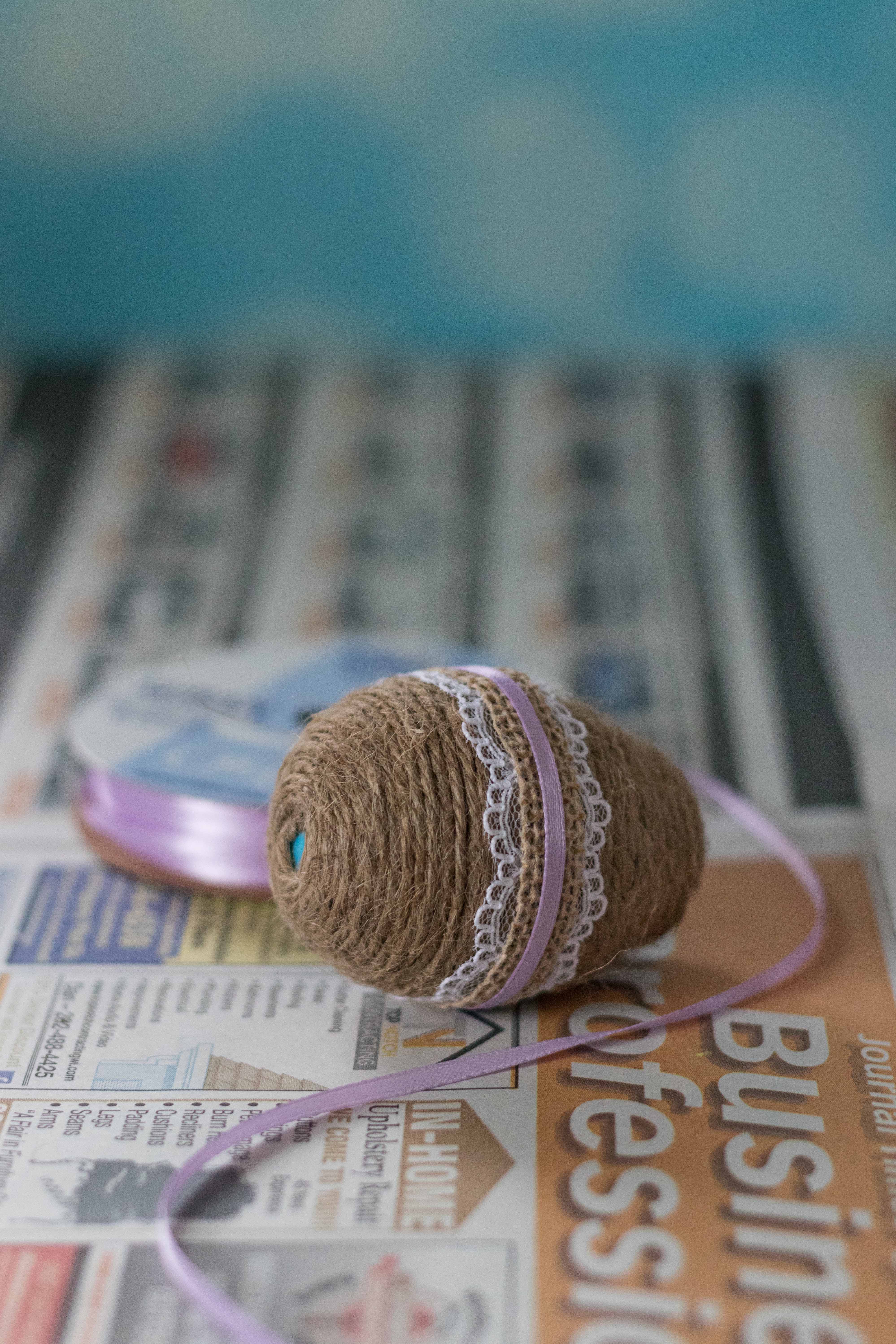 DIY Twine Wrapped Plastic Easter Eggs with Lace and Ribbon | https://www.roseclearfield.com