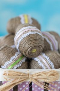 DIY Twine Wrapped Plastic Easter Eggs with Lace and Ribbon | https://www.roseclearfield.com