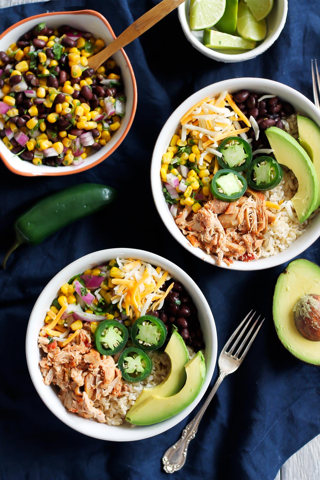 30 Days of Healthy Chicken Dinner Recipes - Chicken Burrito Bowls via Ambitious Kitchen | https://www.roseclearfield.com