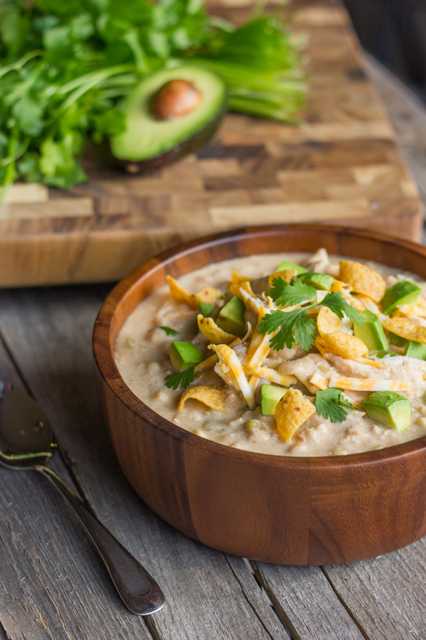 30 Days of Healthy Chicken Dinner Recipes - Creamy Slow Cooker White Chicken Chili via Lovely Little Kitchen | https://www.roseclearfield.com