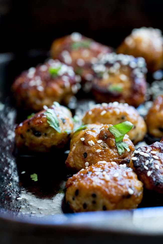 30 Days of Healthy Chicken Dinner Recipes - Tray Baked Sticky Sesame Chicken Meatballs via Sprinkles and Sprouts | https://www.roseclearfield.com