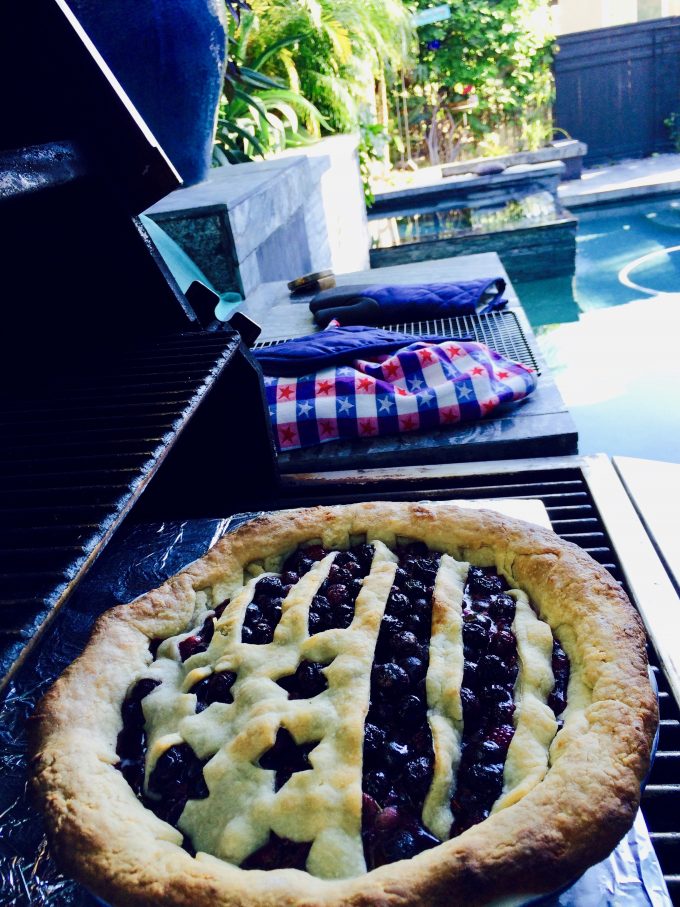 30 Days of Grilled Desserts - Grill Baked Blueberry Pie via Delicious Table | https://www.roseclearfield.com