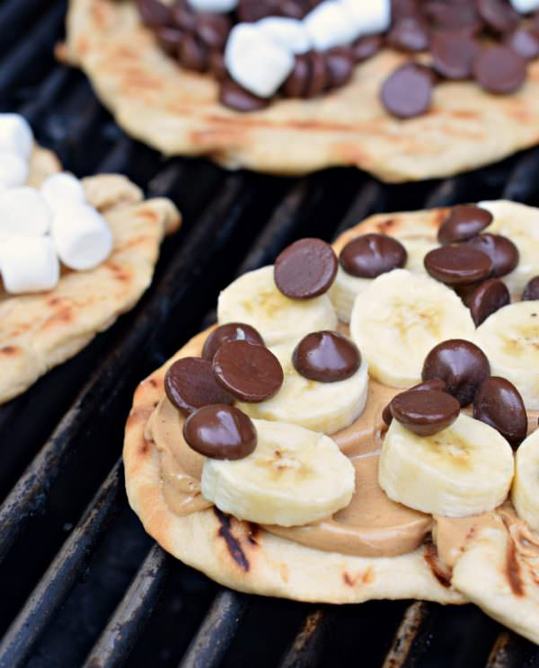 30 Days of Grilled Desserts - Grilled Dessert Pizza with Peanut Butter, Bananas, and Chocolate Chips via Shugary Sweets | https://www.roseclearfield.com