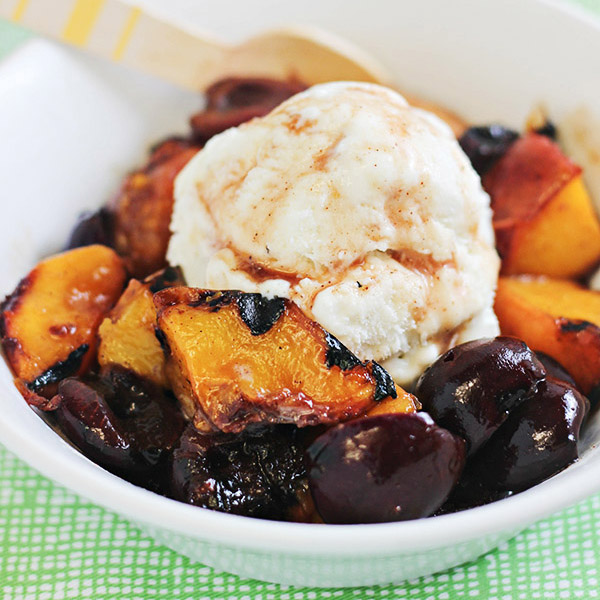 30 Days of Grilled Desserts - Grilled Peaches and Cherries with Cinnamon Honey Syrup via Home Cooking Memories | https://www.roseclearfield.com