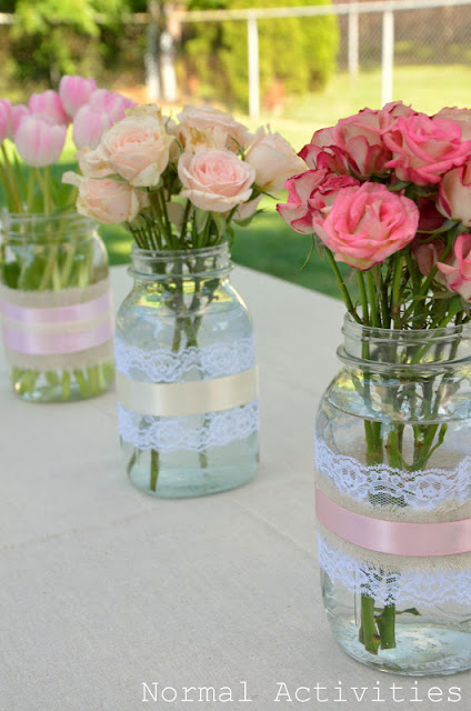 Spring Mason Jar Decor - Lace and Ribbon Wrapped Mason Jar Vases via Normal Activities | https://www.roseclearfield.com