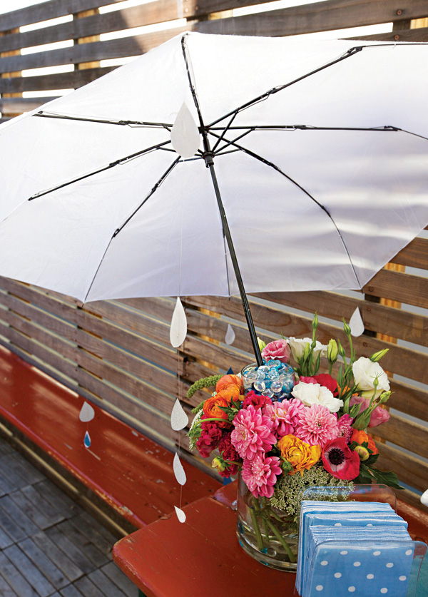 April Showers Bring May Flowers Baby Shower - Umbrella Floral Centerpiece via Hostess with the Mostess | https://www.roseclearfield.com