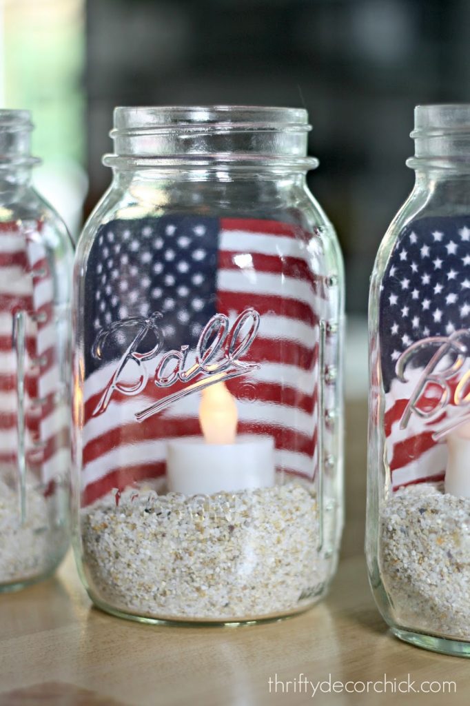 4th of July Mason Jar Decor - American Flag LED Candle Mason Jars via Thrifty Decor Chick | https://www.roseclearfield.com