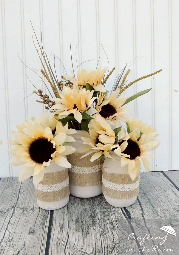 DIY Fall Mason Jar Decor - Fall Mason Jars with Burlap and Flowers via Crafting in the Rain | https://www.roseclearfield.com