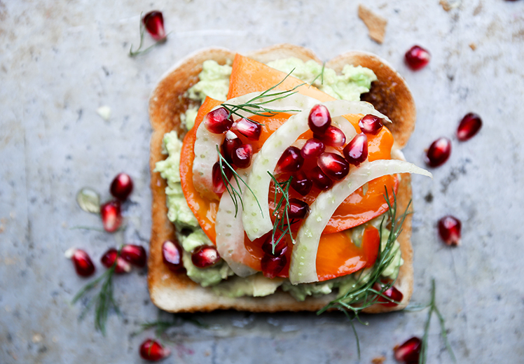 Fall and Winter Avocado Toast Recipes - Avocado Toast with Persimmon Pomegranate and Fennel via Floating Kitchen | https://www.roseclearfield.com