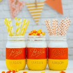 DIY Halloween Mason Jar Decor - Candy Corn Mason Jars for Halloween via Mason Jar Crafts Love | https://www.roseclearfield.com