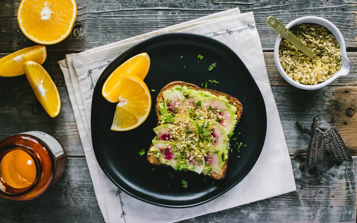 Fall and Winter Avocado Toast Recipes - Winter Avocado Toast with Cheezy Pumpkin Seed Sprinkle via One Green Planet | https://www.roseclearfield.com