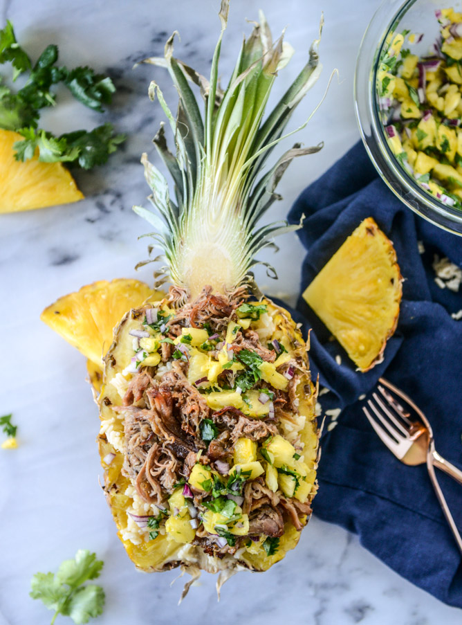 30 Days of Healthy Slow Cooker Dinner Recipes - Slow Cooker Jerk Pork in Pineapple Rice Bowls via How Sweet Eats | https://www.roseclearfield.com