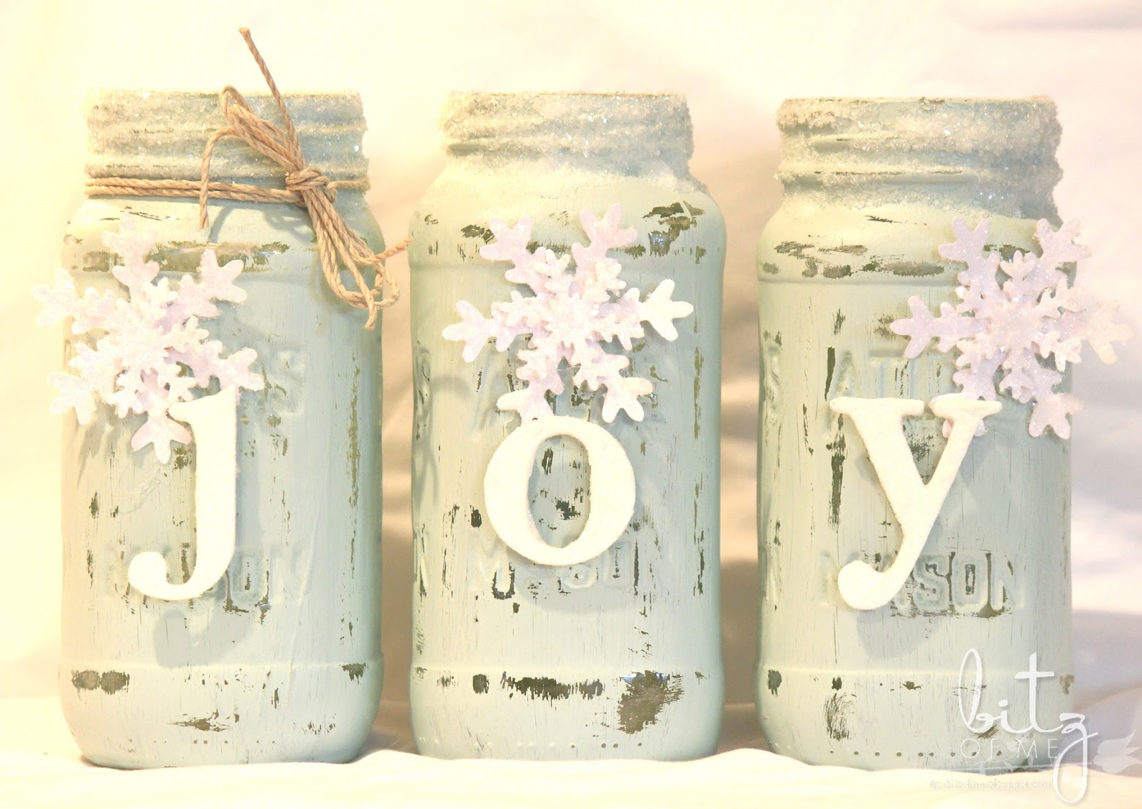 DIY Christmas Mason Jar Decor - Joy Painted Snowy Mason Jars via Tiny Bitz of Me | https://www.roseclearfield.com