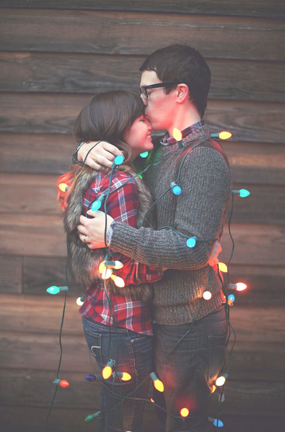 20 Creative Holiday Photo Ideas - Wrapped in Christmas Lights by Haley Sheffield via Brit + Co | https://www.roseclearfield.com