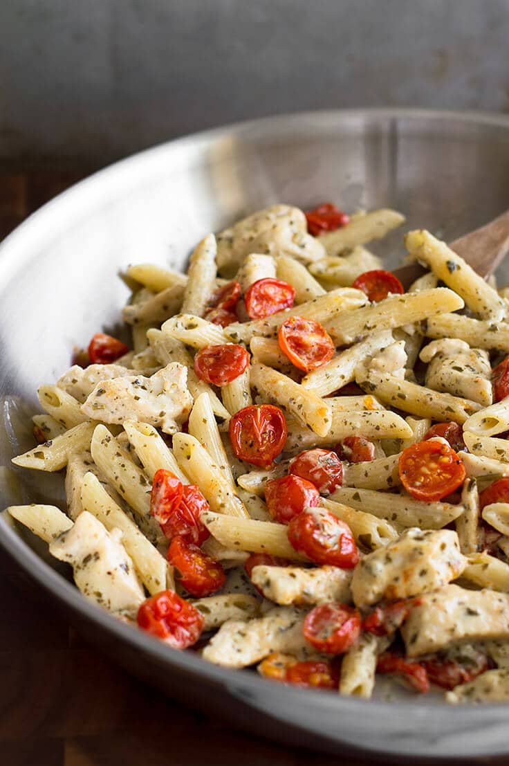 30 Healthy Dinner Recipes for Two - Easy Pesto Chicken Pasta for Two With Oven Roasted Tomatoes via Baking Mischief | https://www.roseclearfield.com