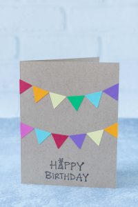 Multicolored bunting happy birthday DIY greeting card. #handmadecard #birthdaycardidea #colorfulbunting | https://www.roseclearfield.com