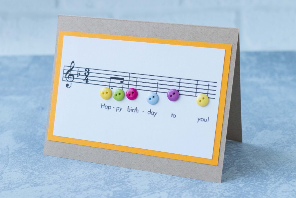 Happy birthday sheet music with buttons card, inspired by Nikelcards on Etsy. #birthdaycard #sheetmusic #happybirthday | https://www.roseclearfield.com