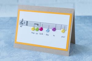 Happy birthday sheet music with buttons card, inspired by Nikelcards on Etsy. #birthdaycard #sheetmusic #happybirthday | https://www.roseclearfield.com