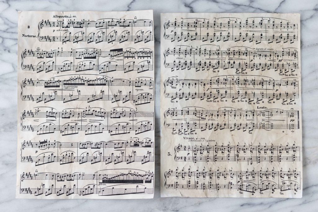 Crumpling your brand new paper before antiquing it adds to the aged aesthetic.