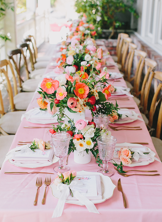 Stunning coral & pink strawberry baby shower with strawberry dotted floral centerpieces, via Inspired By This. #babyshower #flowers #floralcenterpieces | https://www.roseclearfield.com