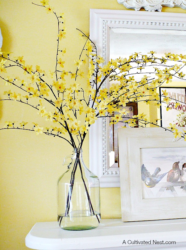 Spring Mantel Inspiration - Decorating With Glass Bottles via A Cultivated Nest | https://www.roseclearfield.com