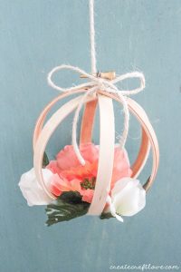 Spring embroidery hoop wreath decor: love this DIY embroidery hoop orb filled with spring florals via Create Craft Love. #homedecor #spring #floral | https://www.roseclearfield.com