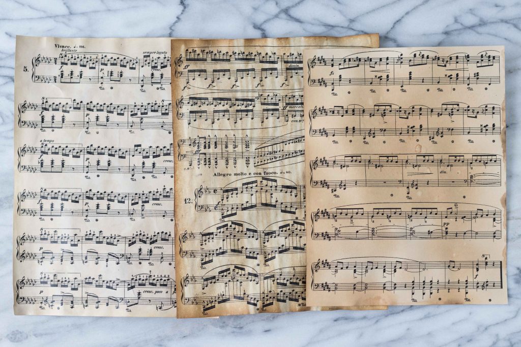 Three of the most common mediums for creating antiqued paper: tea, coffee, and lemon juice.