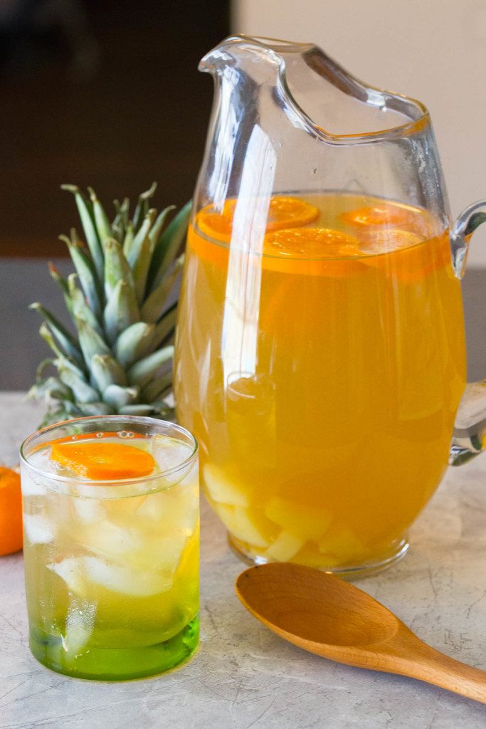 Non-alcoholic drinks for Easter: add pineapple and orange to green tea for a fun flavor twist, via Slim Pickin's Kitchen | https://www.roseclearfield.com