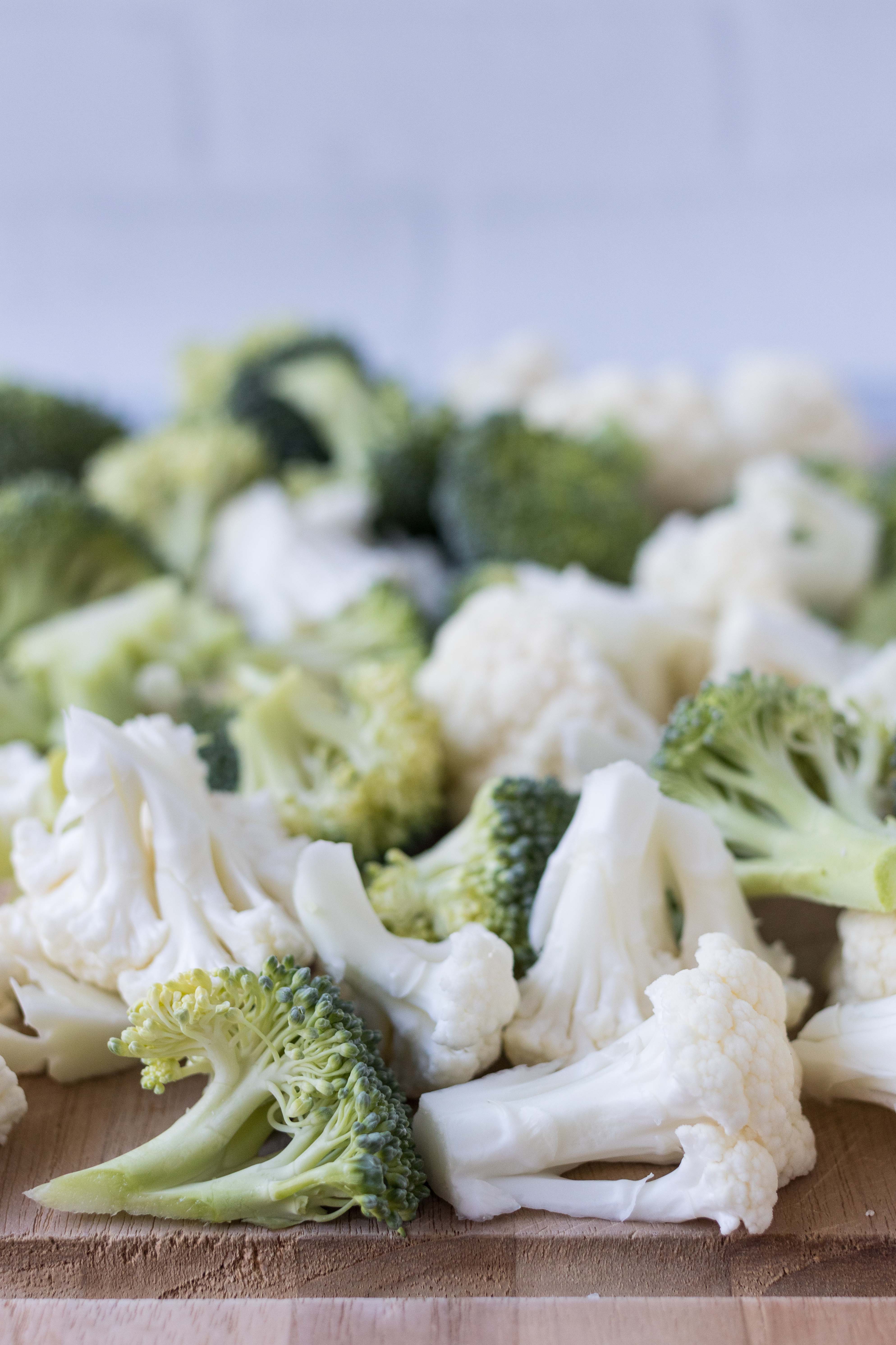 Broccoli and cauliflower for sheet pan gnocchi with chicken sausage. #roastedvegetables #broccoli #cauliflower | https://www.roseclearfield.com