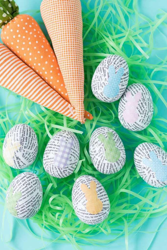 Learn how to make DIY book page plastic Easter eggs with upcycled book pages! A simple, easy, fun Easter decorating craft project. #Easter #upcycled #bookpages | https://www.roseclearfield.com