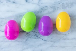 DIY Book Page Plastic Easter Eggs. A whimsical, upcycled Easter decorating idea that's fun for the whole family! #Easter #DIY #bookpagecrafts | https://www.roseclearfield.com