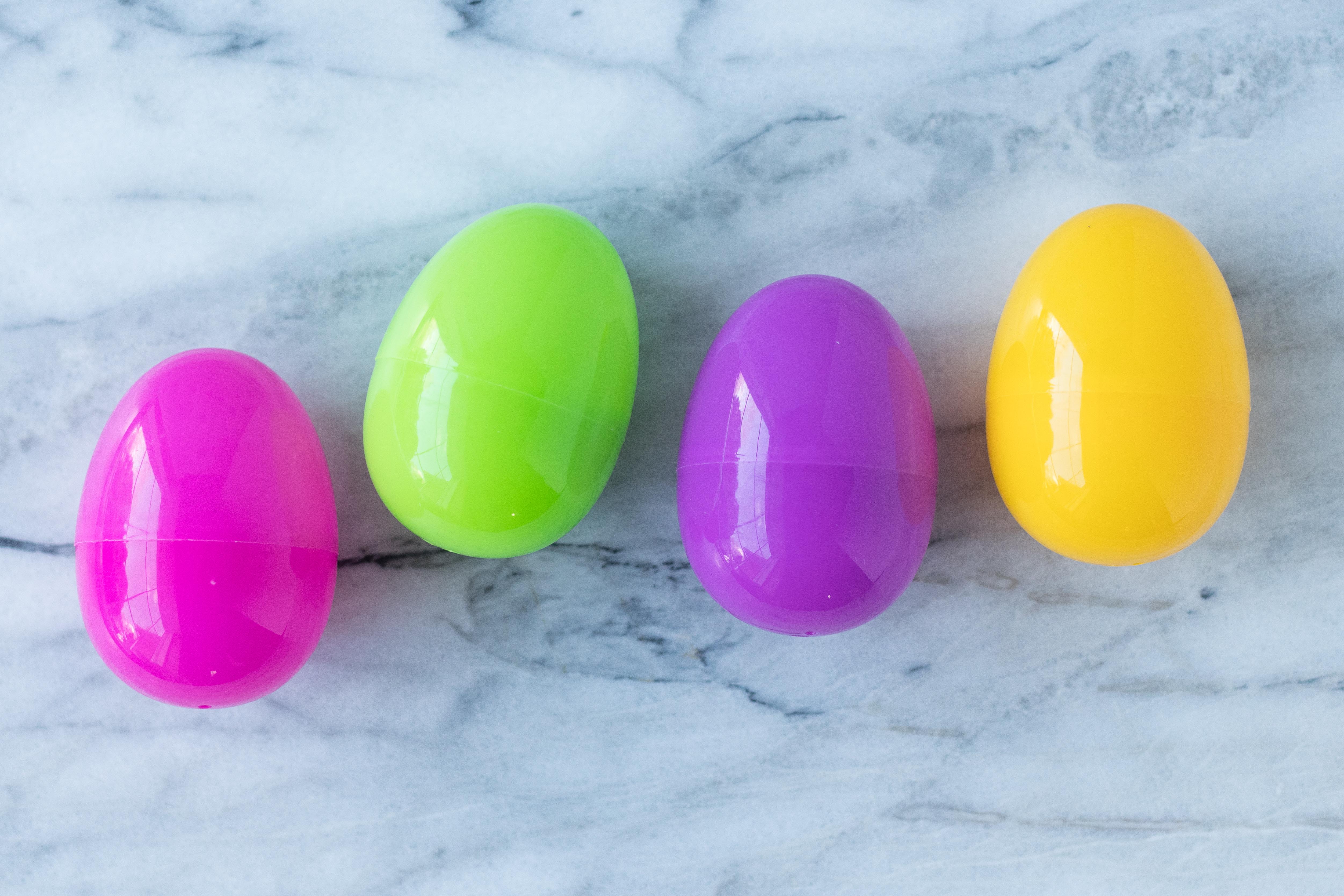 DIY Book Page Plastic Easter Eggs. A whimsical, upcycled Easter decorating idea that's fun for the whole family! #Easter #DIY #bookpagecrafts | https://www.roseclearfield.com