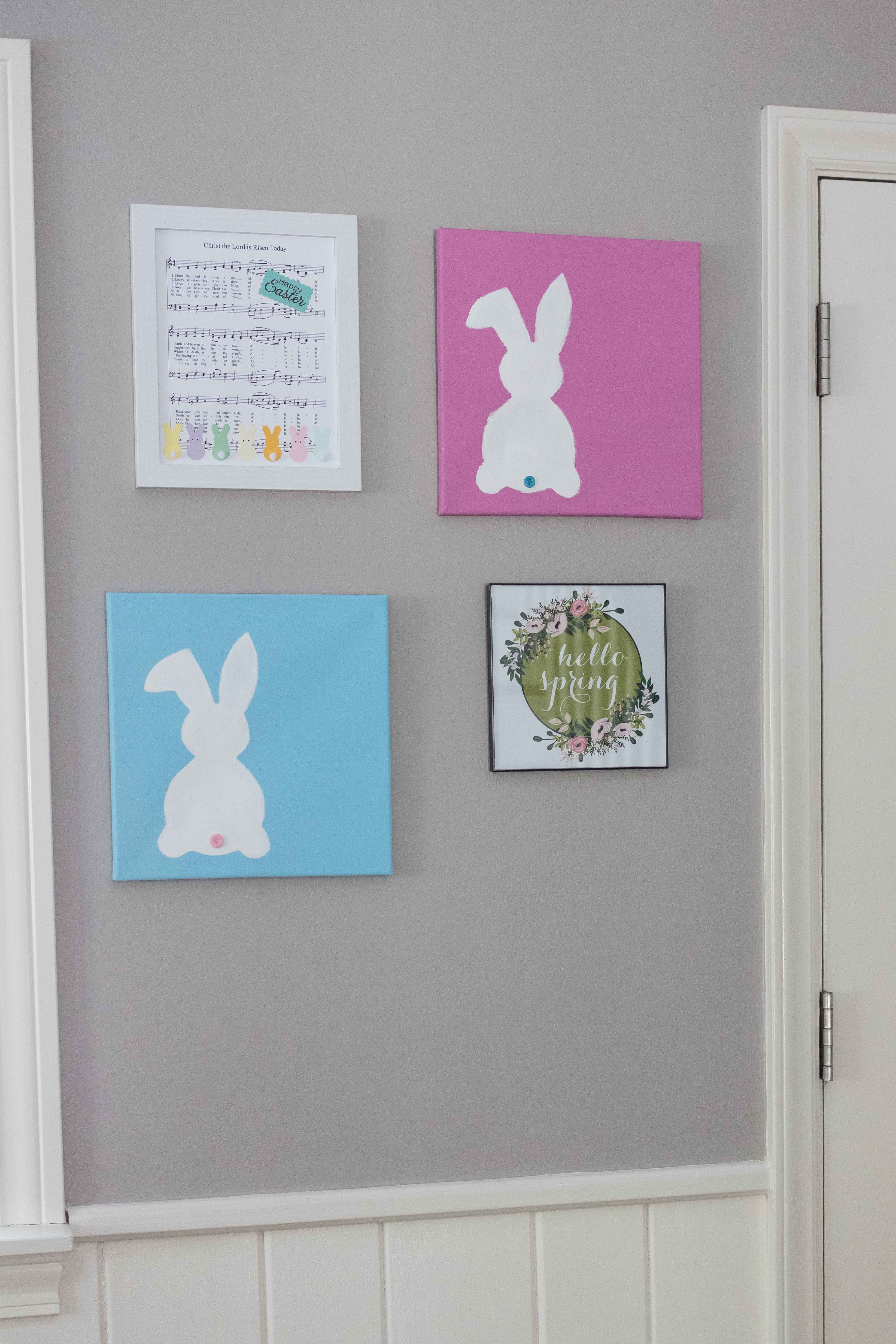 A cheery spring entryway display with DIY Easter sheet music wall decor, DIY bunny canvases, and a free spring printable! #spring #wallart #seasonaldecor | https://www.roseclearfield.com