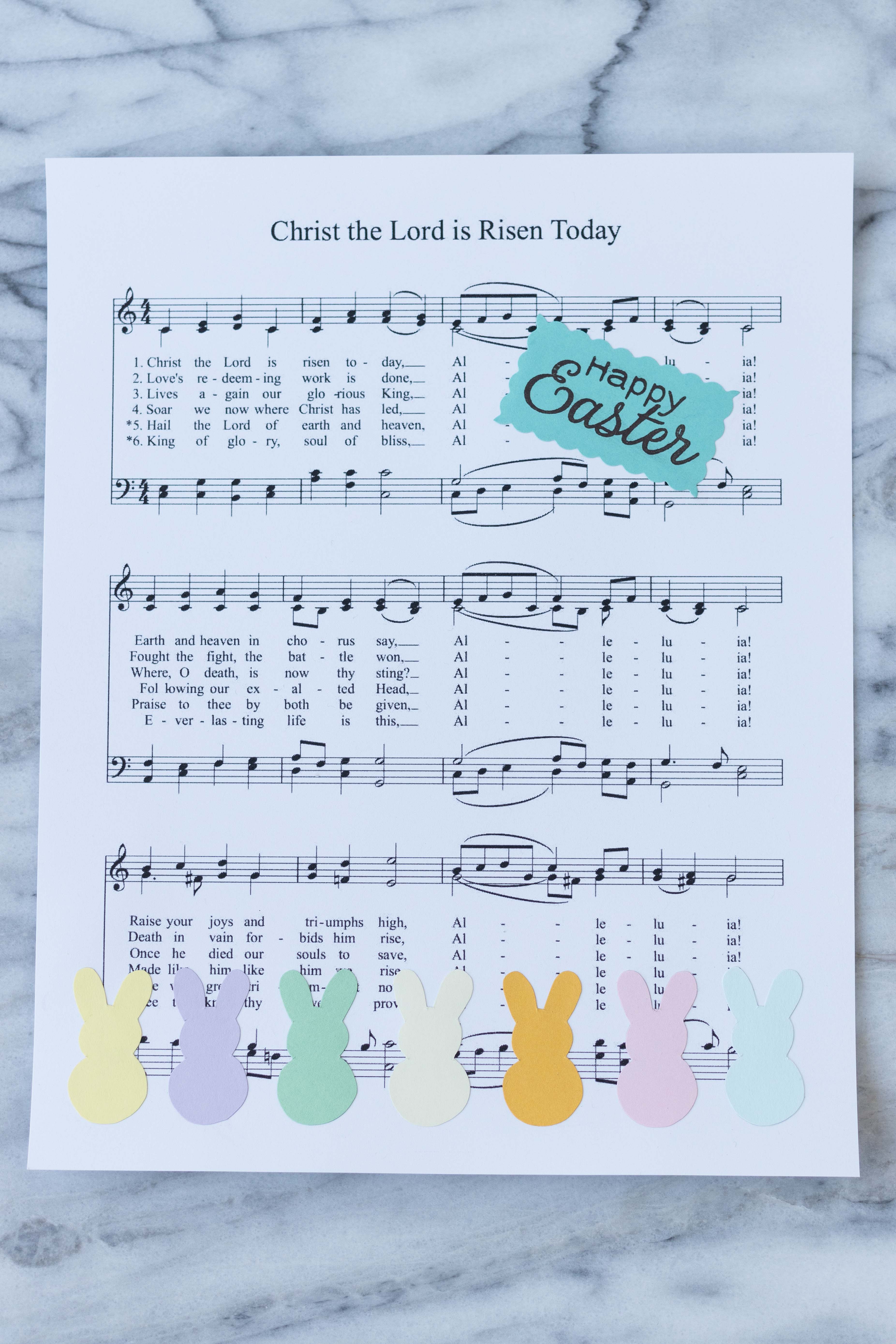 DIY Easter sheet music wall decor in progress! #Easter #DIY #sheetmusic | https://www.roseclearfield.com