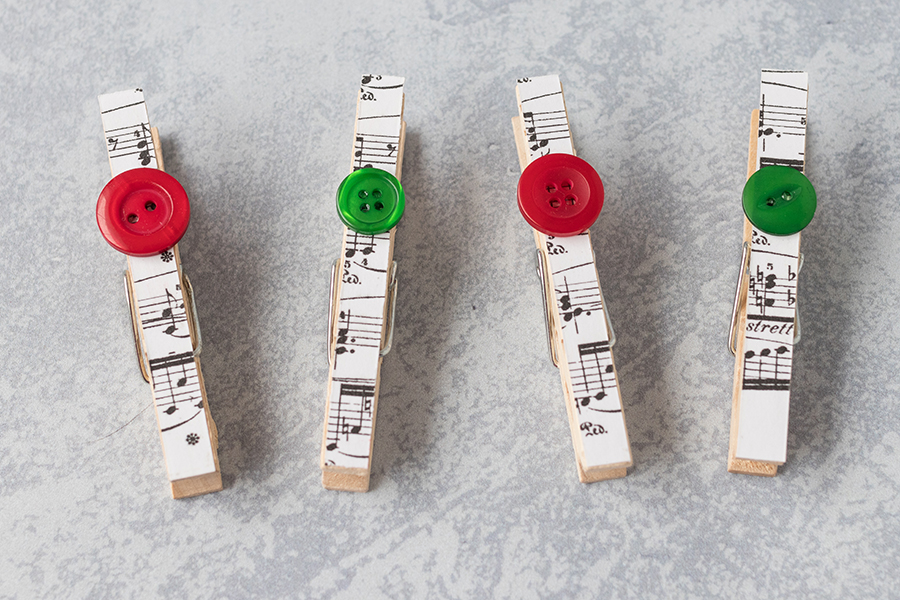 Christmas DIY sheet music clothespin magnets. Simple holiday home decor project! #Christmas #homedecor #clothespins | https://www.roseclearfield.com