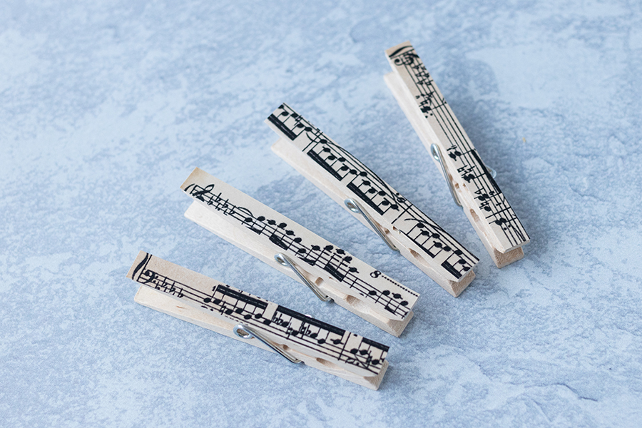 DIY sheet music clothespin magnets in progress. #DIY #sheetmusic #clothespins | https://www.roseclearfield.com