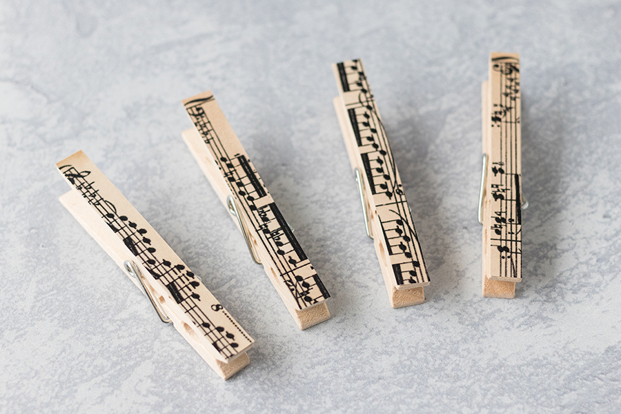 DIY sheet music clothespin magnets are an easy quick home decor project to make for yourself or to give as a gift. #musicteachergift #DIY #homedecor | https://www.roseclearfield.com